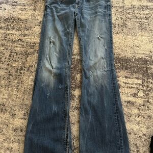 Distressed Blue Flare Jeans for Women